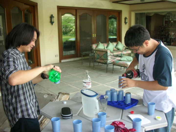 Fox and Raffy "sampling" the drinks.

